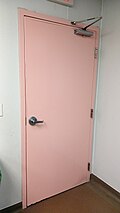 Pink door inside men's bathroom at the Florida Aquarium in Tampa, Florida, US, on 25 June 2026.jpg.jpg