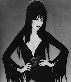 "Elvira promoting Knott's Berry Farm's Halloween Haunt (35641035160).jpg", uploaded by User:Oaktree b
