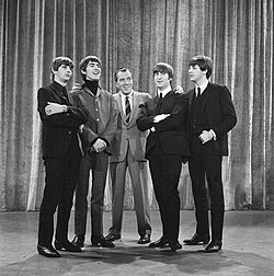 "Beatles with Ed Sullivan.jpg", uploaded by User:Ymnes