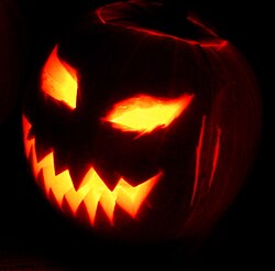 "Jack-o'-Lantern 2003-10-31.jpg", uploaded by User:Toby Ord)